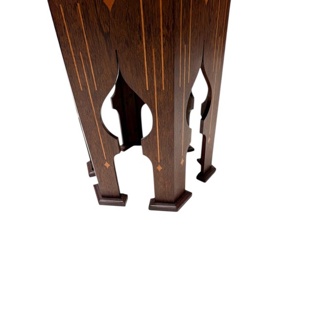 Stunning and elegant Arts & Crafts side table. Striking Dutch design from the 1900s. Solid wenge base with inlay and...