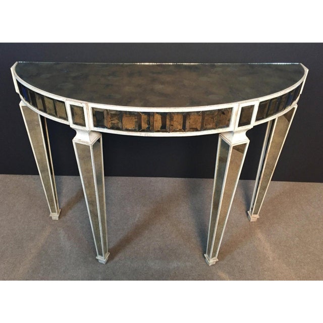 Amy Howard Demi-lune Console table. Beveled glass mirrored jeweled gallery. All mirrors have an old world antique look....
