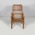 Italian mid-century modern armchairs with armrest in rattan, 1960s Set of three rattan armchairs. The seat and backrest...