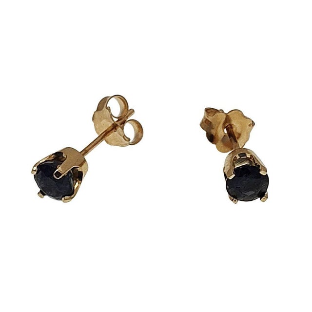 Estate 1 CTW Sapphire Stud Earrings. These estate stud earrings are crafted in 14 karat yellow gold and feature a pair of...