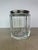 Vintage lidded jar by Plata Lappas of Argentina, featuring a substantial octagonal faceted crystal body paired with a...