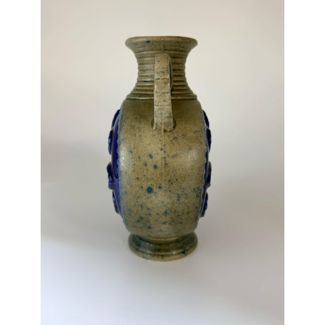 This striking mid-century modern ceramic vase was manufactured in West Germany by the renowned company Jasba Keramik...