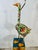 This is a whimsical and artistic lamp designed in the shape of a bird, likely resembling a goose or stork. The lamp...