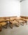 A very rare set of fourteen danish mid century wooden dining chairs in stained oak and woven cane seats and backs. This...