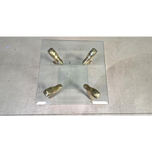 Elegant 4 legged solid brass side table with two tier clear glass tops. Beautiful piece, timeless and will combine in lots...