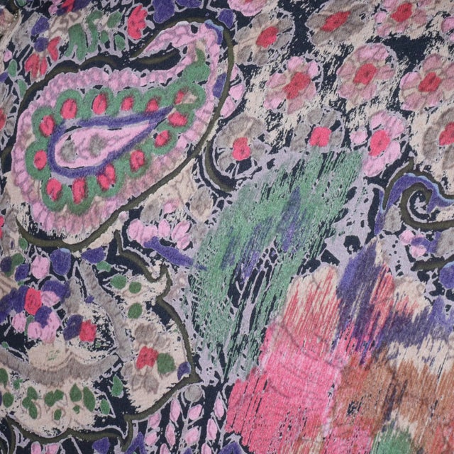 Stunning pair of Bergere arm chairs by Weiman. Creamy lacquered frame with the the most magnificent paisley ikat silk...