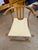 Unknown designer although in Thonet style. Two folding chairs with arms and upholstered seat stamped made in Romania....