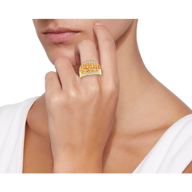 A classic, Cocktail ring 2.25 Carat Oval Cut Yellow Natural Sapphire &amp; Diamond 14 Karat Yellow Gold Ring Three rows of...