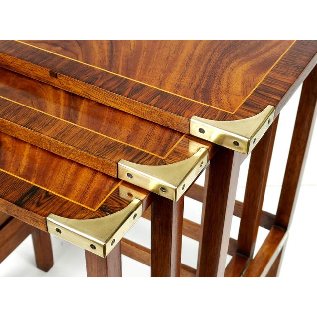 Bring classic English elegance and cozy vintage charm into your home with this lovely set of three nesting tables. Crafted...