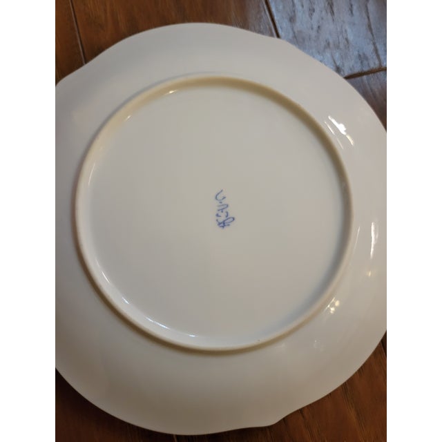 A cute floral, bamboo, and bunny pattern make this plate a geat display piece.