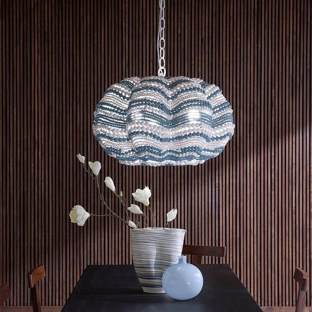 This casual coastal look is expertly crafted from dozens of hand-carved mango wood beads in varying sizes. The design is...