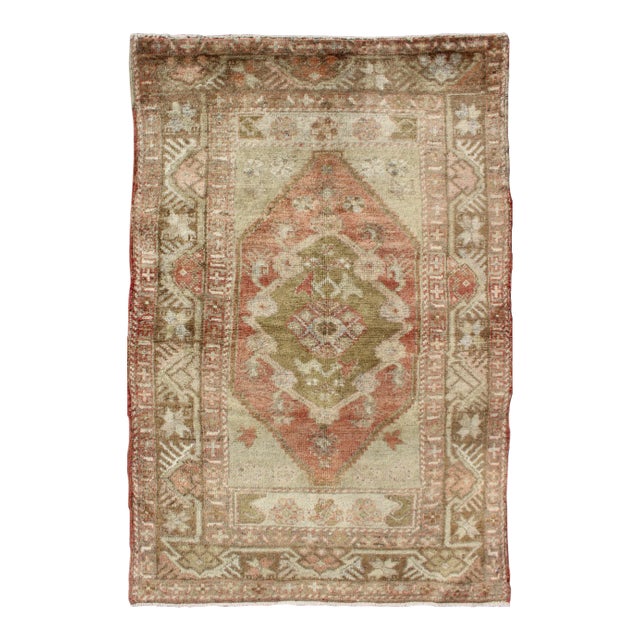 Vintage Turkish Oushak Rug With Soft Sage, Coral, and Faded Ivory Tones 3′1″ × 4′10″ For Sale