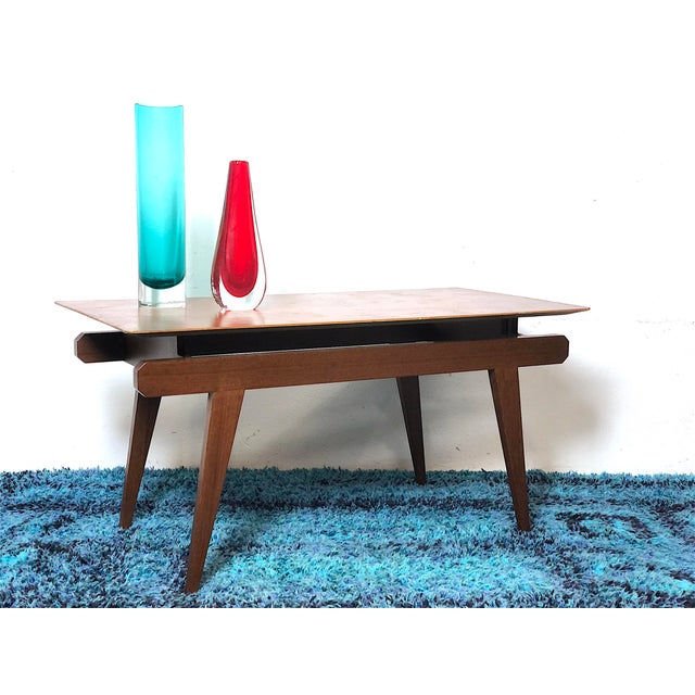 Vintage 1960s Coffee Table. Italian-made coffee table with a Scandinavian style from the 1960s, entirely made of wood with...