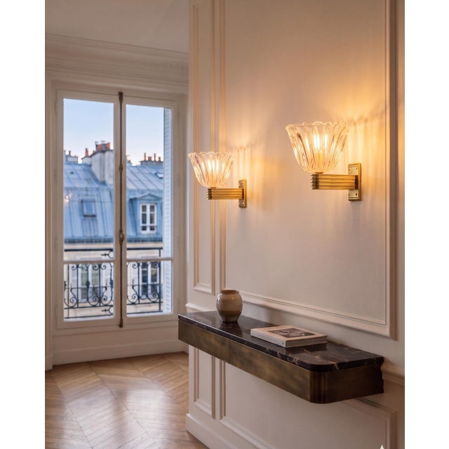 Set of 2 Murano glass wall lamps by Ercole Barovier, Italy These lamps, designed by the renowned Italian glass master...