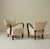 This pair of Art Deco chairs, by Czech designer Jindrich Halabala, showcases his signature bentwood craftsmanship. The...