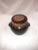 Kathy Kale pottery bean pot in traditional brown drip glaze. Diameter measures 9” with handles, 7” without and 7.5”H with...