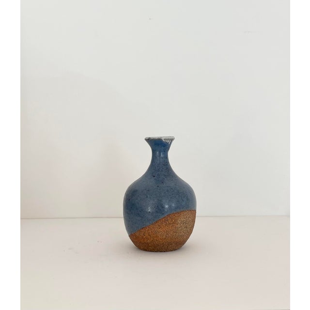 Vintage pottery bud vase / weed pot, with cornflower blue glaze.