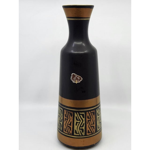 A West German ceramic art vase (West Germany Pottery), representative of the handcrafted production of the late 1950s. The...