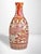An extraordinary example of Japanese aka-e Kutani porcelain, this tokkuri (sake bottle). The style is Kinrande (金襴手 -...
