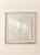 A striking vintage wall mirror with a bold layered geometric design and polished chrome-tone framing. Multiple beveled...
