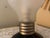 A playful and collectible vintage IKEA BLINDA table lamp from the 1990s, featuring an oversized light bulb design. This...