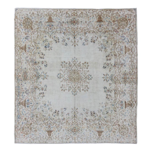 Antique Persian Kerman Rug Featuring Central Medallion and Delicate Botanical Motifs 6′10″ × 7′1″ For Sale