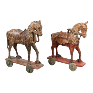 Pair of Monumental Indian Polychrome Carved Wood Horses on Wheels, 19th C.