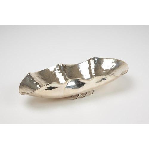 Centerpiece crafted from a hand-embossed 800 silver sheet. Shell-shaped feet and an 800 hallmark on the base. Made by eros...