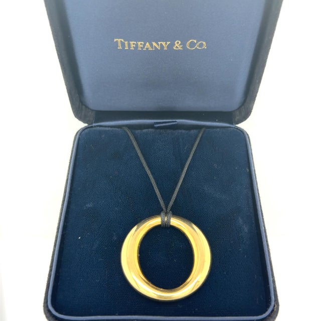 Designed by the legendary Elsa Peretti for Tiffany & Co., the Sevillana Pendant Necklace is a timeless expression of...