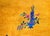 A wonderful and brilliant early 20th century Chinese Art Deco rug with a brilliant gold central field surrounded by a wide...