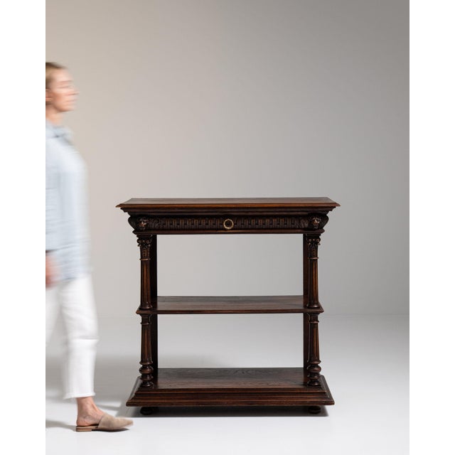 Here is a piece, its dark carved wood, scroll acanthus the first thing to catch the eye. The piece dates to 19th Century,...