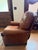 Super comfortable leather recliner chair. In good condition for a previously used chair. SOft brown leather with metal...
