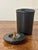 A sculptural Mid-Century Modern studio ceramic jar finished in a rich slate black glaze with an organically textured...