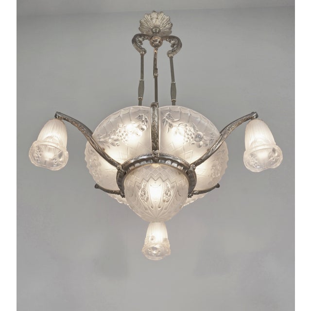 Paul Gilles A stunning large French 1930 art deco chandelier in nickel plated bronze or solid brass holding 10 shades in...