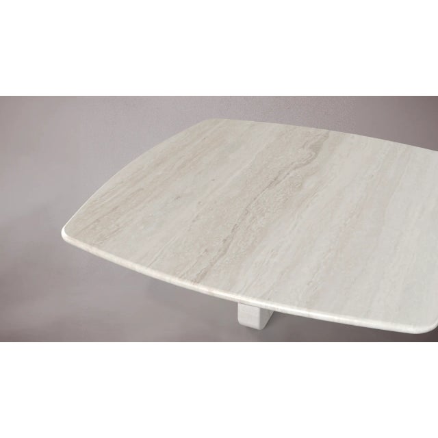 Bring a touch of timeless elegance to your living space with this square travertine coffee table. Crafted from natural...