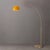 The Half Dome 92" Arc Lamp is a dimmable Mid-Century Modern arc lamp with a weathered brass finish, offering adjustable...