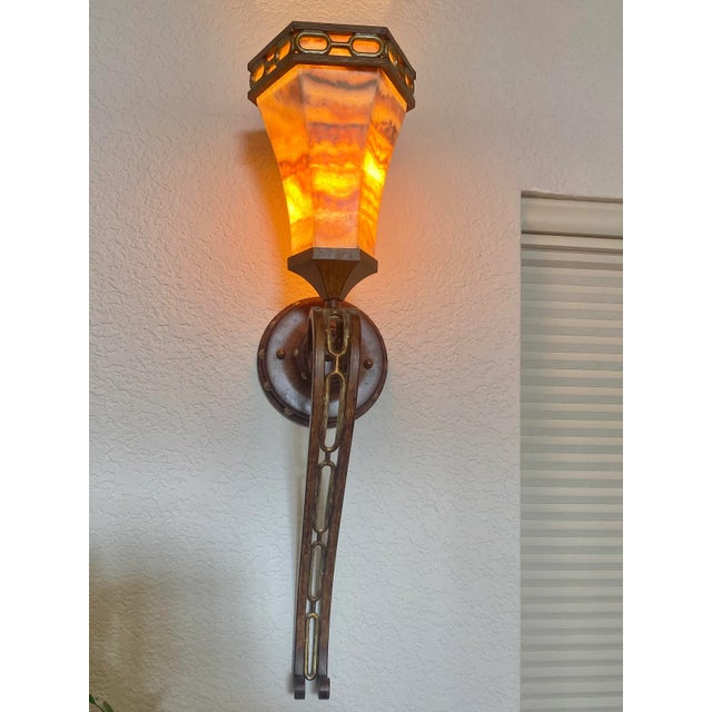 Vintage Exquisite and Unique Alabaster and Metal Torchiere Sconces. They are in Excellent Condition. They give off a soft...