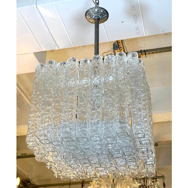 Handmade Mid Century style Italian cube shaped pendant light with clear textured glass tubes and nickel finish hardware....