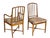 An exceptional set of six mid-century dining chairs, including two armchairs and four side chairs, in the style of Seven...