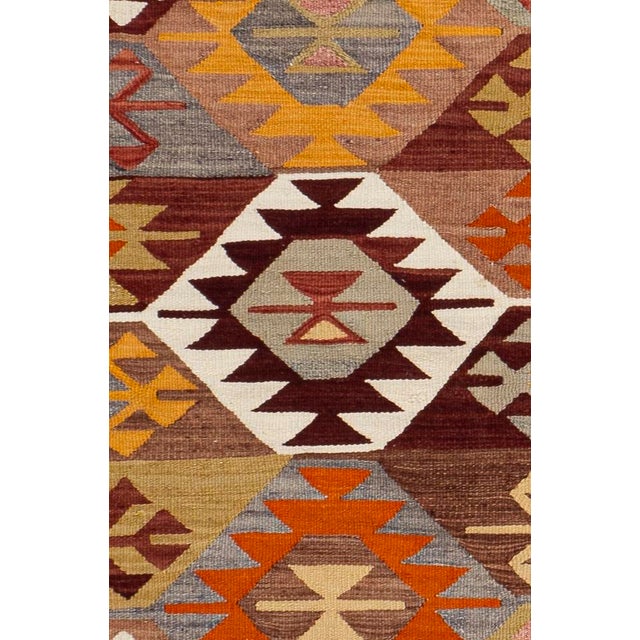 This vintage Turkish flat weave Kilim is hand-woven. The simplicity and boldness of this piece can also give a...