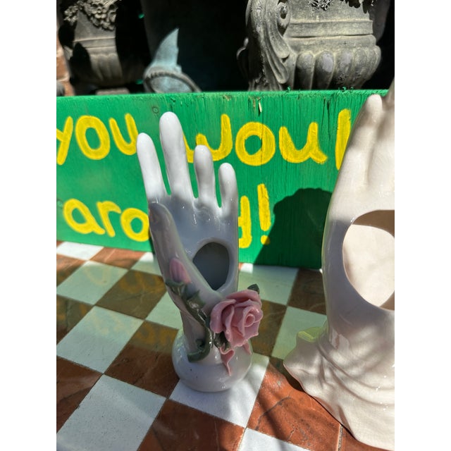 Up for consideration is a beautiful pair of white ceramic hand vases. These would look lovely in your home and they are a...