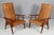 Hans J. Wegner model GE-260 pair of lounge chairs new upholstered with cognac vintage full grain aniline leather. Frame of...