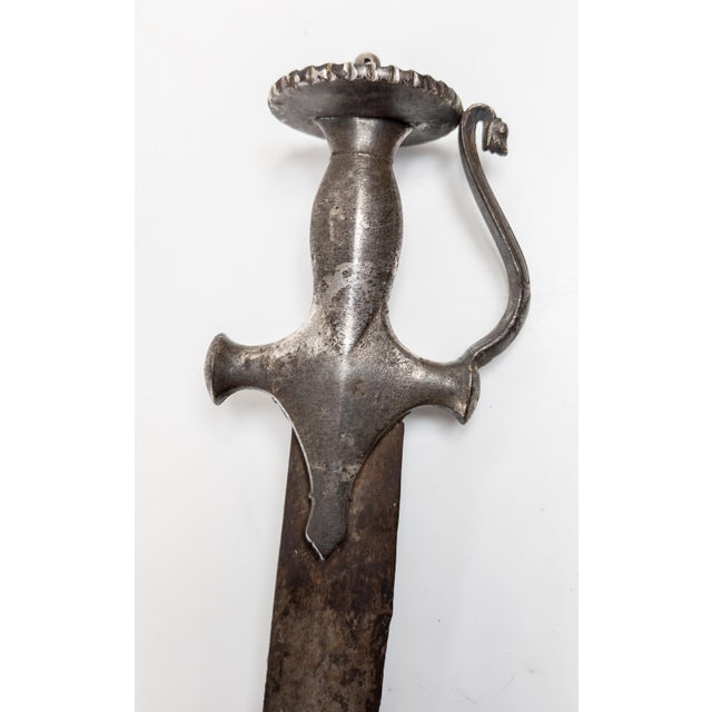 We are selling this nice old Indian steel Tulwar sword. This sword probably dates to the mid 18th century. It has...