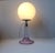 - Pink trumpet-shaped table light in pink glass - Prdoduced by Royal Copenhagen in collaboration with Holmegaard in...