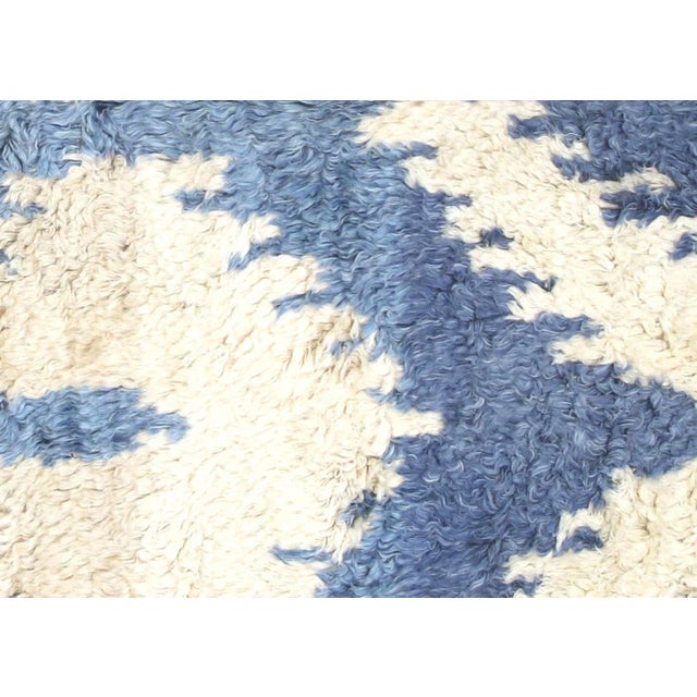 Contemporary Egyptian Tulu Rug. Hand woven in an Ikat design with wool on cotton foundation in the Nile delta region of...
