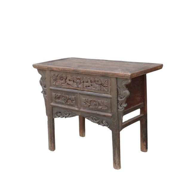 This early 18 century hand carved table is a rare find. This antique Chinese 3 drawers chest console table showcases...