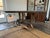 Beautiful rustic wood console table with a very interesting tree branch base.