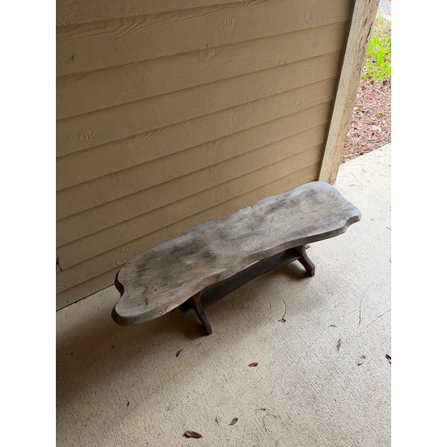 Absolutely stunning primitive wood bench. Antique, very old. Wear consistent with age.