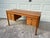 Beautiful midcentury modern desk by Domino Mobler. Beautiful teak wood and sculpted pulls. Six drawers provide great...