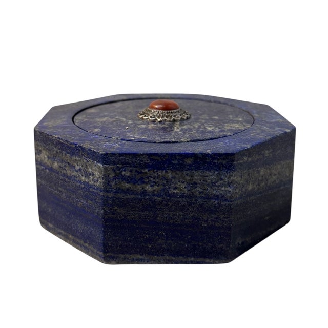 5”W x 2”H x 5”D Elevate your design with this exquisitely carved lapis lazuli box, a captivating piece that seamlessly...